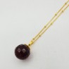 Vergulde ketting met ronde Granaat rode quartz