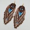 Lange beaded tassel oorbellen turkoois goudkleurig boze oog
