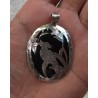 Zilveren grote hanger met zilveren vogel op zwarte Onyx