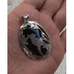 Zilveren grote hanger met zilveren vogel op zwarte Onyx