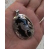 Zilveren grote hanger met zilveren vogel op zwarte Onyx