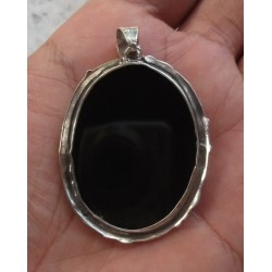Zilveren grote hanger met zilveren vogel op zwarte Onyx