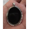 Zilveren grote hanger met zilveren vogel op zwarte Onyx