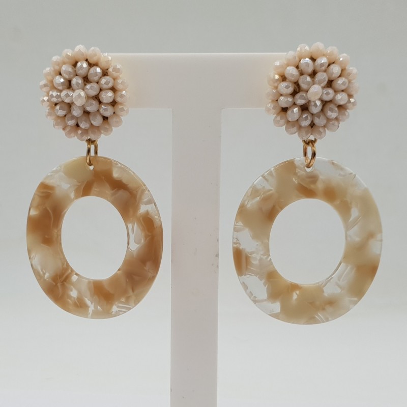Vergulde oorbellen met kristallen en resin