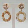 Vergulde oorbellen met kristallen en resin