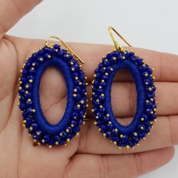 Vergulde glassberry oorbellen ovaal kobalt blauw