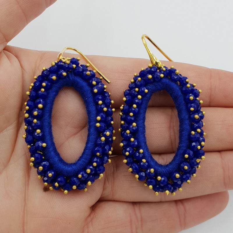 Vergulde glassberry oorbellen ovaal kobalt blauw
