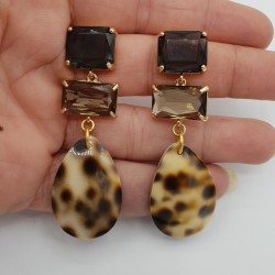Vergulde oorbellen kristal en Cowrie