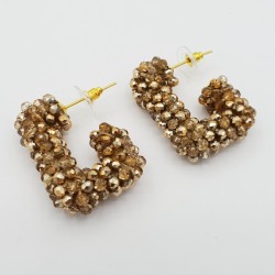 Rechthoekige glassberry creolen goudkleurig