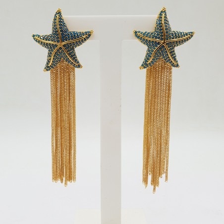 Vergulde oorbellen zeester met Turkoois blauwe crystals