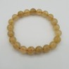 Stretch armband met gouden Rutielkwarts