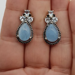 Zilveren oorbellen met Aquamarijn blauw Topaas en zwarte Spinel