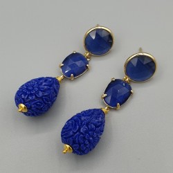 Vergulde oorbellen blauwe resin en Kattenoog