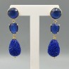 Vergulde oorbellen blauwe resin en Kattenoog