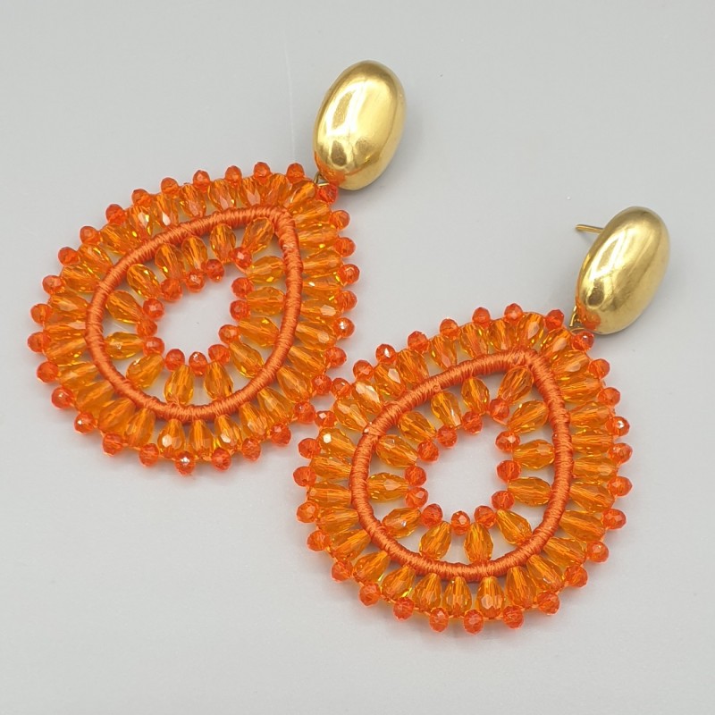 Vergulde oorbellen met oranje druppelvormige hanger