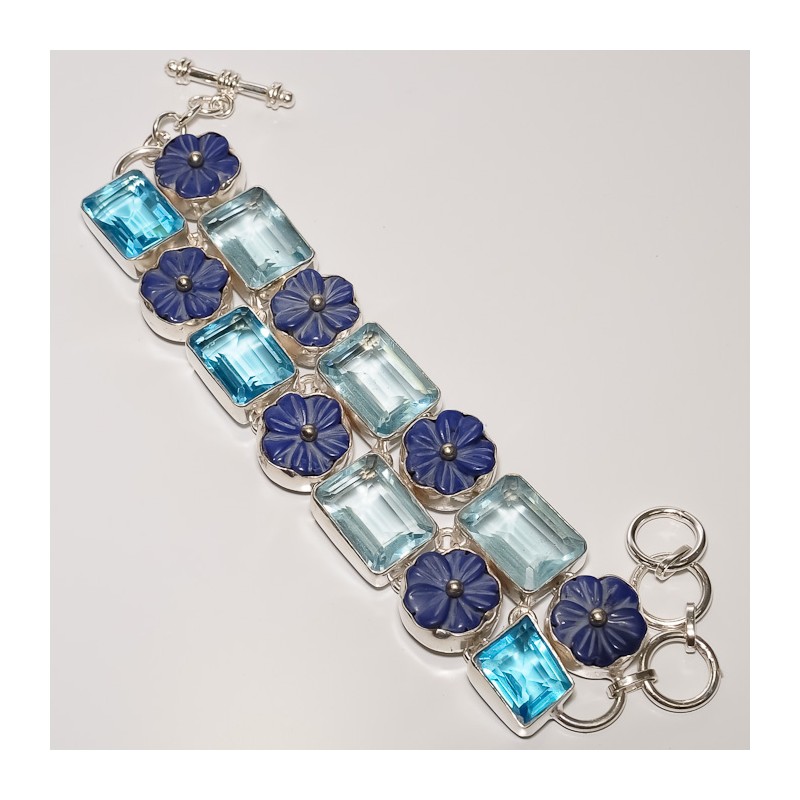 Zilveren edelsteen armband met blauw Topaas en bloem uit Lapis