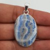 Zilveren hanger gezet met ovale cabochon Scheeliet