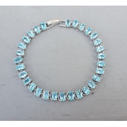 Zilveren armband gezet met ovale facet geslepen Apatiet