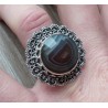Zilveren ring ronde facet Botswana bewerkte kop en band 17 mm