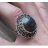 Zilveren ring ronde facet Botswana bewerkte kop en band 17 mm