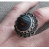 Zilveren ring ronde facet Botswana bewerkte kop en band 17 mm