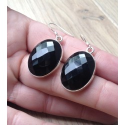 Zilveren edelsteen oorbellen met facet ovale zwarte Onyx