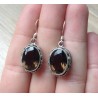 Zilveren oorbellen met ovale Smokey Topaas in bewerkte setting