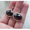 Zilveren oorbellen met grote ovale cabochon Granaat
