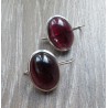Zilveren oorbellen met grote ovale cabochon Granaat