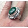 Zilveren ring met Malachiet in bewerkte kop en band maat 18.5 mm