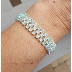 Zilveren armband gezet met drie rijen Apatiet
