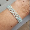 Zilveren armband gezet met drie rijen Apatiet