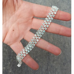 Zilveren armband gezet met drie rijen Apatiet