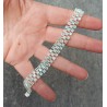 Zilveren armband gezet met drie rijen Apatiet