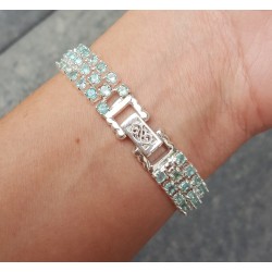 Zilveren armband gezet met drie rijen Apatiet