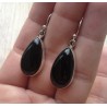Zilveren oorbellen druppelvorm met cabochon zwarte Onyx