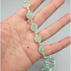 Zilveren ketting rond om gezet met ronde facet aqua Chalcedoon