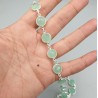 Zilveren ketting rond om gezet met ronde facet aqua Chalcedoon