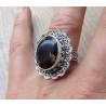 Zilveren ring met Smokey Topaas met bewerkte kop en band 17 mm