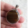 Zilveren hanger met ronde Tijgerijzer