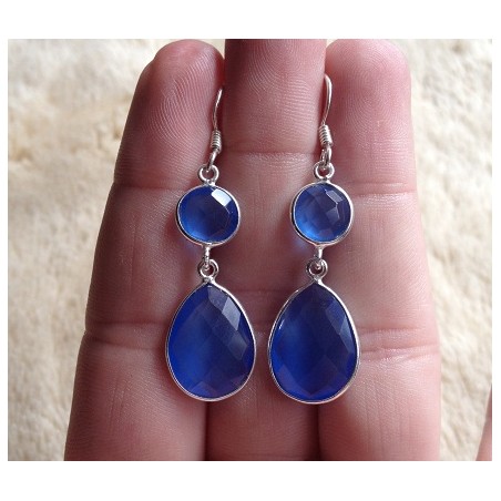 Zilveren oorbellen met ronde en druppelvorm blauw Topaas