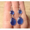 Zilveren oorbellen met ronde en druppelvorm blauw Topaas