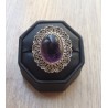Zilveren ring met cabochon Amethist met bewerkte kop 17.5 mm