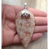 Zilveren hanger met grote Zonnesteen en Granaat