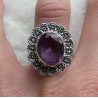 Zilveren ring met facet Amethist met bewerkte kop en band 17.3 m