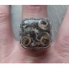Zilveren ring met Turitella in bewerkte setting maat 19 mm