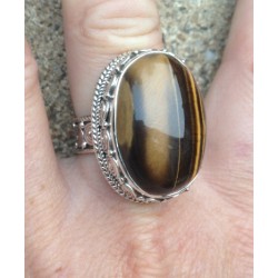 Zilveren ring met grote Tijgeroog in bewerkte setting maat 18.3