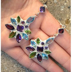 Zilveren oorbellen gezet met blauw Topaas, Amethist en Peridot