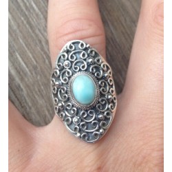 Zilveren ring gezet met Larimar in bewerkte kop maat 18 mm