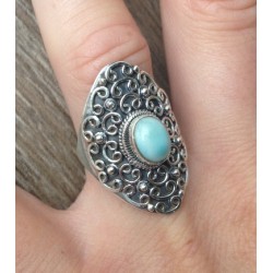 Zilveren ring gezet met Larimar in bewerkte kop maat 18 mm
